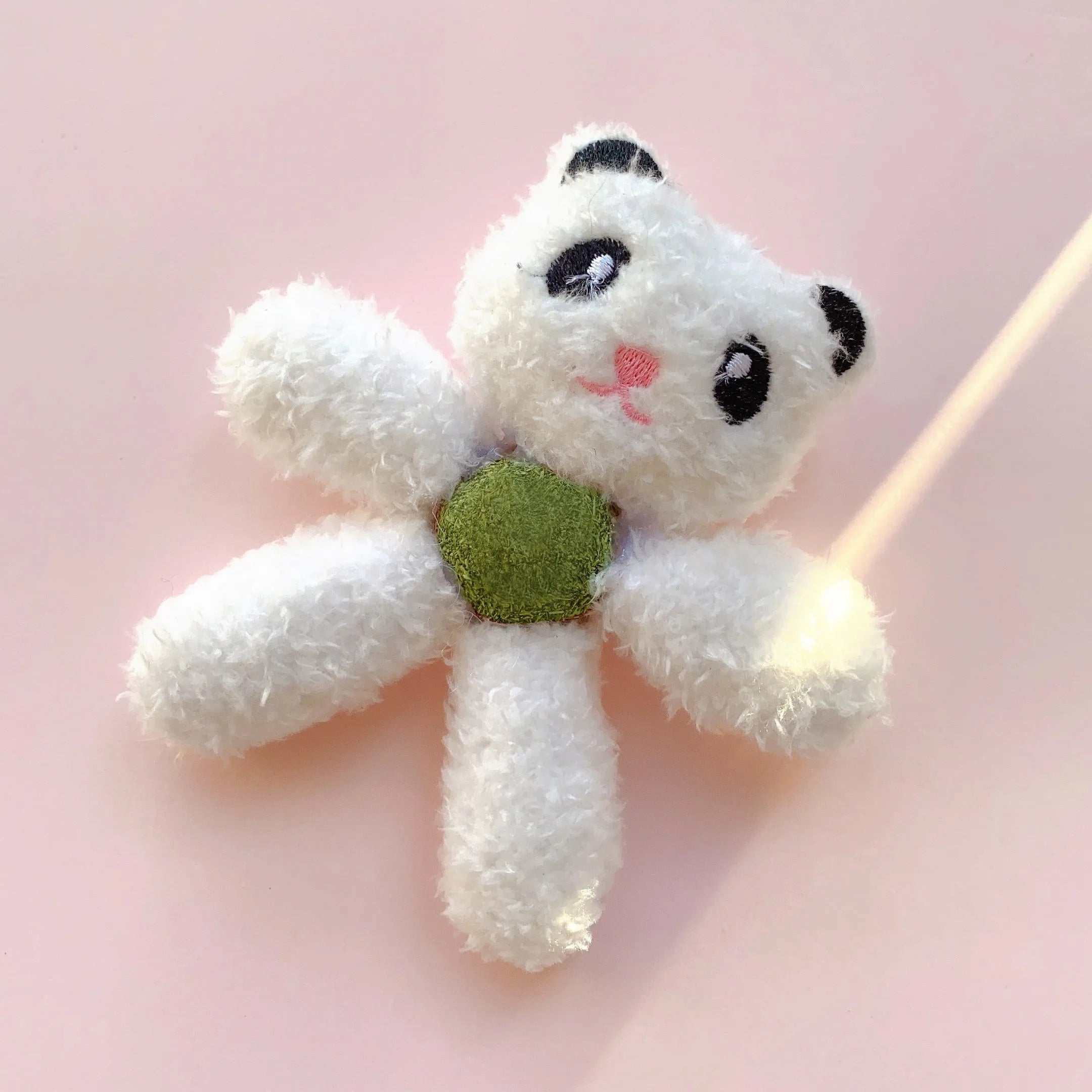 Edible catnip chewing ball in plush animal design with cat grass filling for dental cleaning