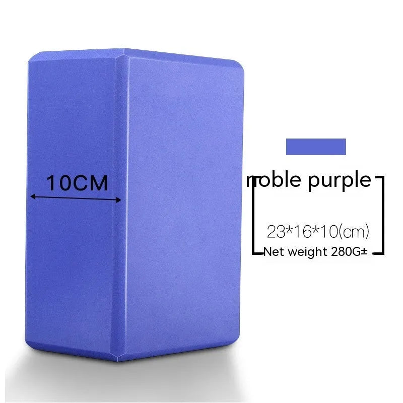 High-density EVA foam yoga block in various colours and prints on a workout mat.