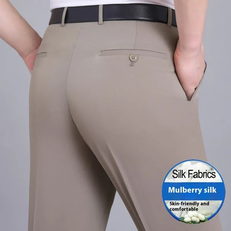 Men's straight leg formal trousers in a dark blue colour, showcasing the high waist and non-iron fabric blend.