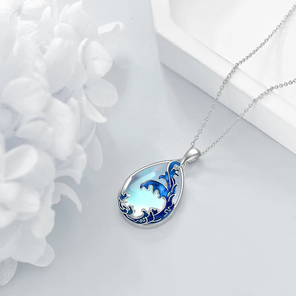 Blue heart-shaped alloy pendant on a chain, a women's necklace.