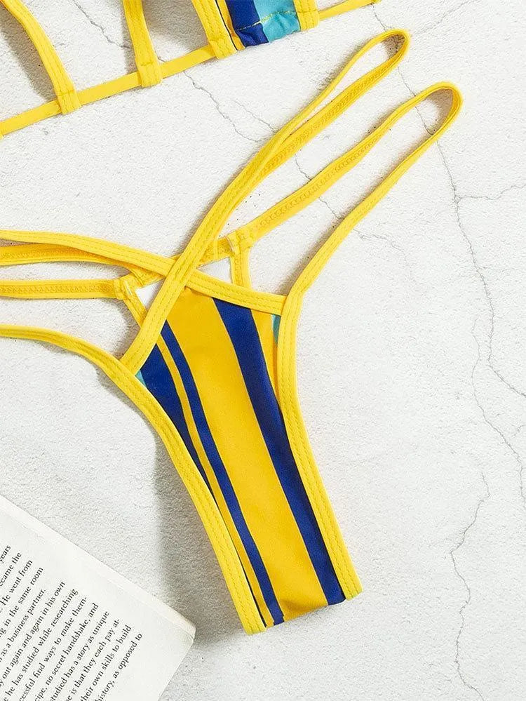 Yellow women's split swimsuit set showing sleeveless top with neck-hanging style and high-waisted bikini shorts.
