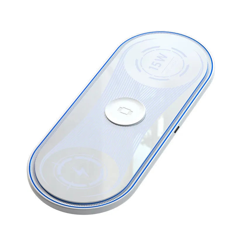 Flat 3-in-1 wireless charger 15W with ambient light in Black, charging a smartphone and earbuds on a desk