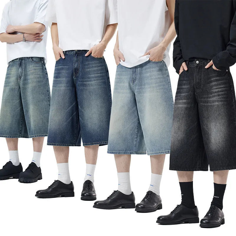 Men's loose fit straight-leg denim shorts in light blue on a plain background