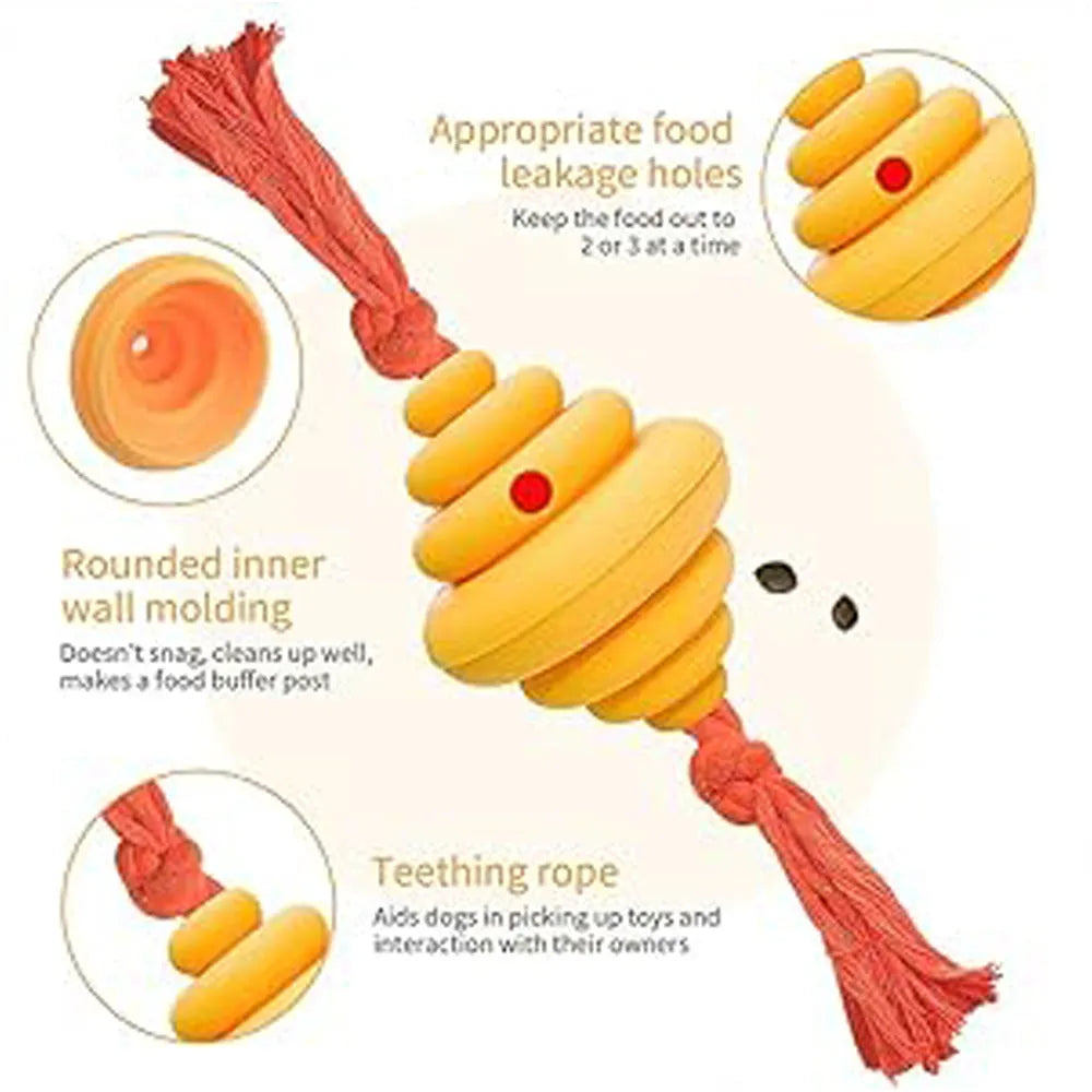 Green and yellow food-dispensing silicone dog ball with an attached rope for tug-of-war.