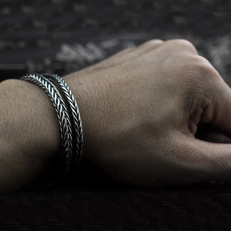 Vintage braided keel bracelet for men in 925 silver with wave design and retro finish, photo colour