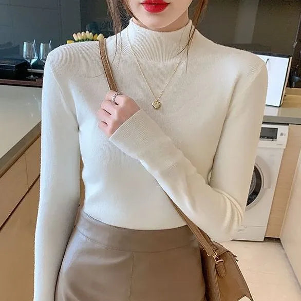 Viscose pullover top slim fit long sleeve in apricot colour showing front view