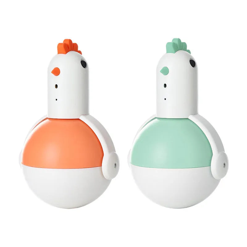 Green or orange electric cat toy chicken with laser and sound features on flat surface