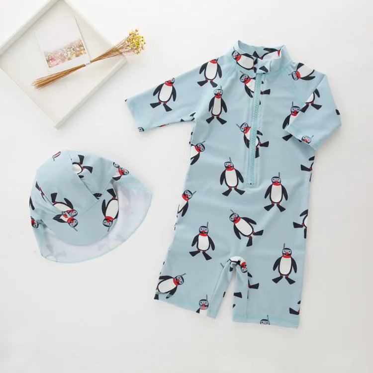 Boys' penguin print long sleeve one-piece swimsuit with matching swimming cap