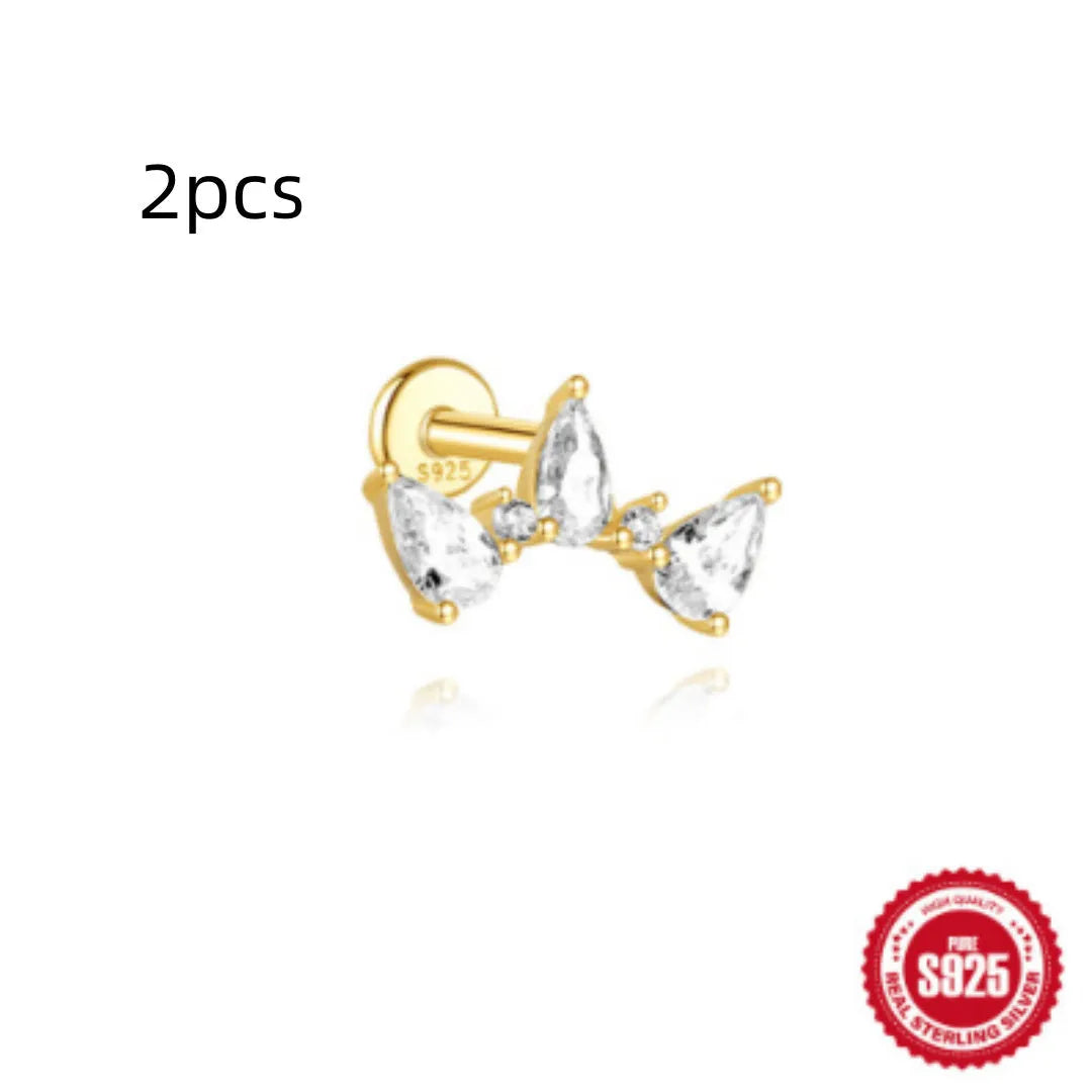 S925 sterling silver water drop shaped earring with a flat spiral puncture pattern, in a gold tone finish.