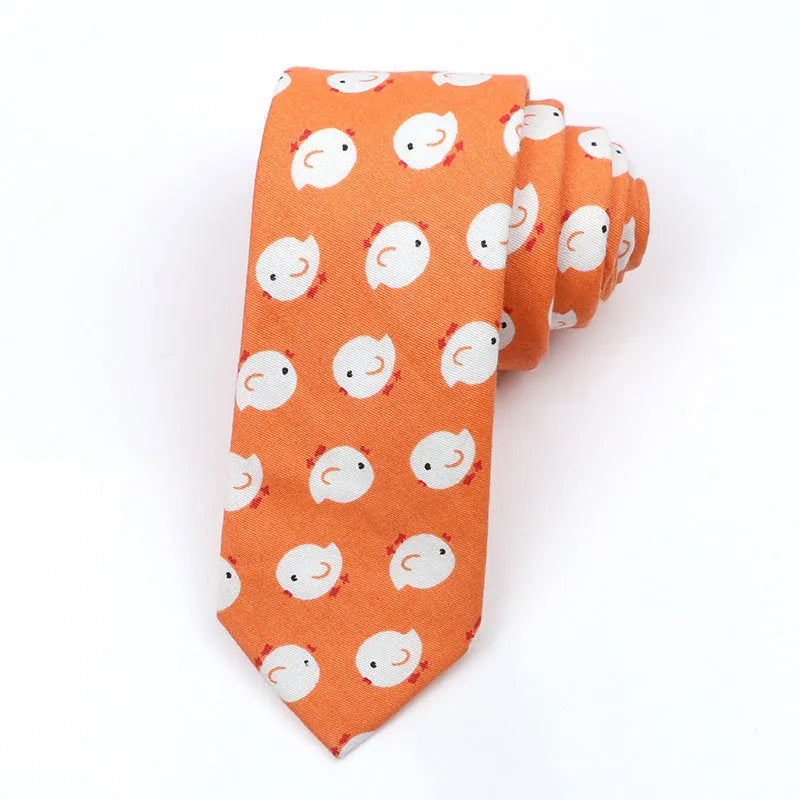 Narrow cotton bow tie with a printed cartoon pattern in a selection of colours.