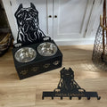 Personalised dog bowl holder with stainless steel bowl and iron frame showing custom name engraving