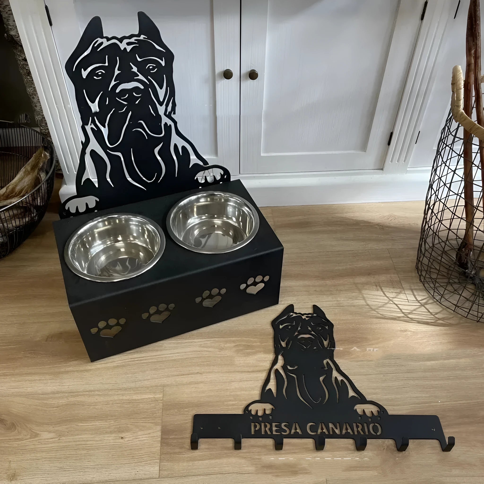 Personalised dog bowl holder with stainless steel bowl and iron frame showing custom name engraving