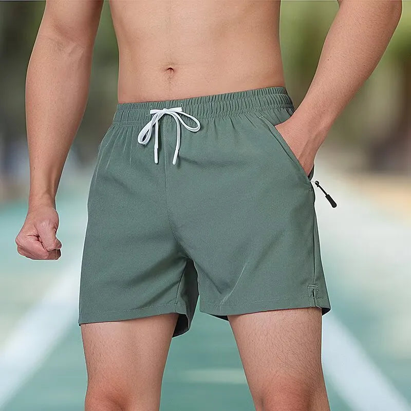 Black polyester fitness shorts with high waist and drawstring closure for men's training
