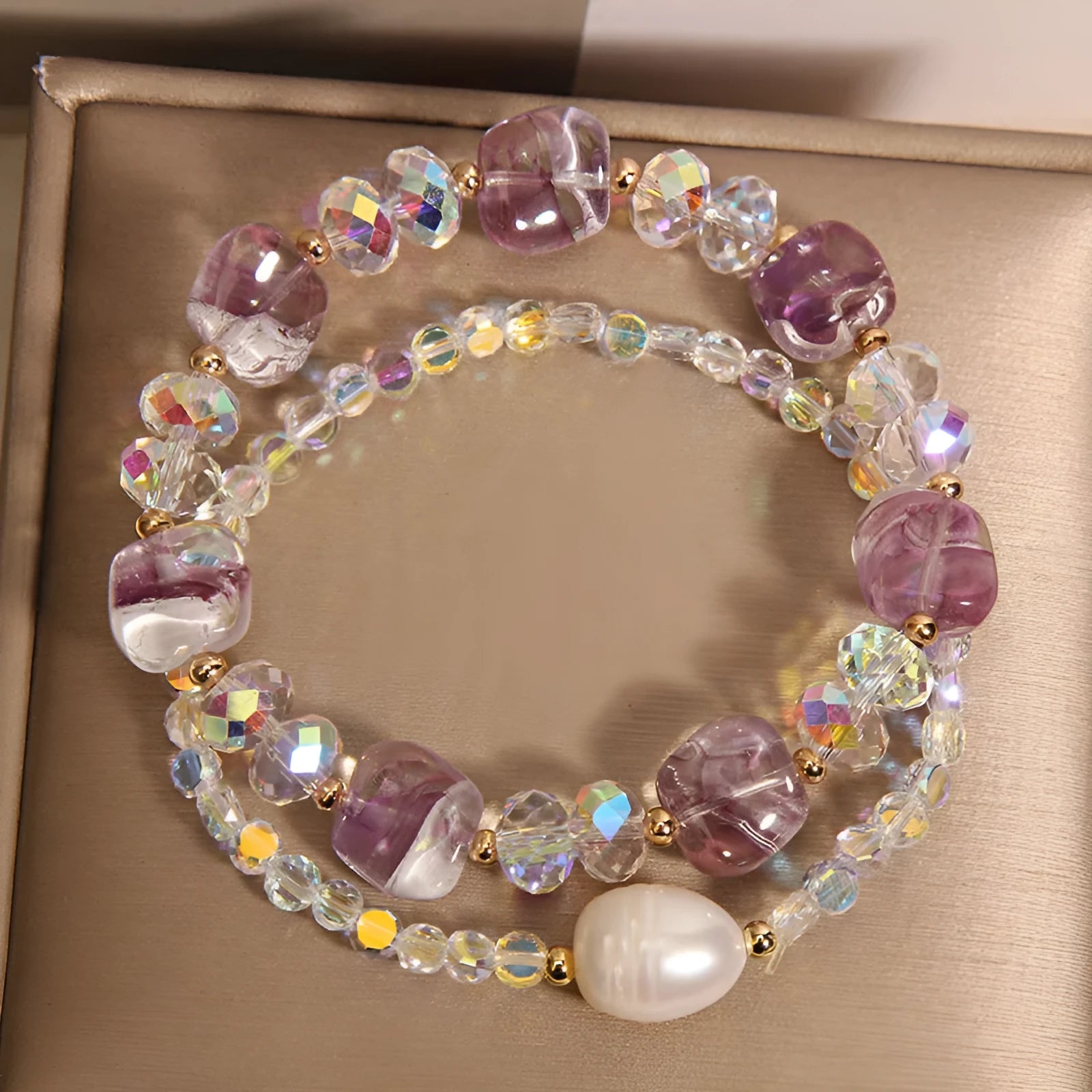 Women's crystal irregular stone bracelet with rhinestone accents available in purple colour