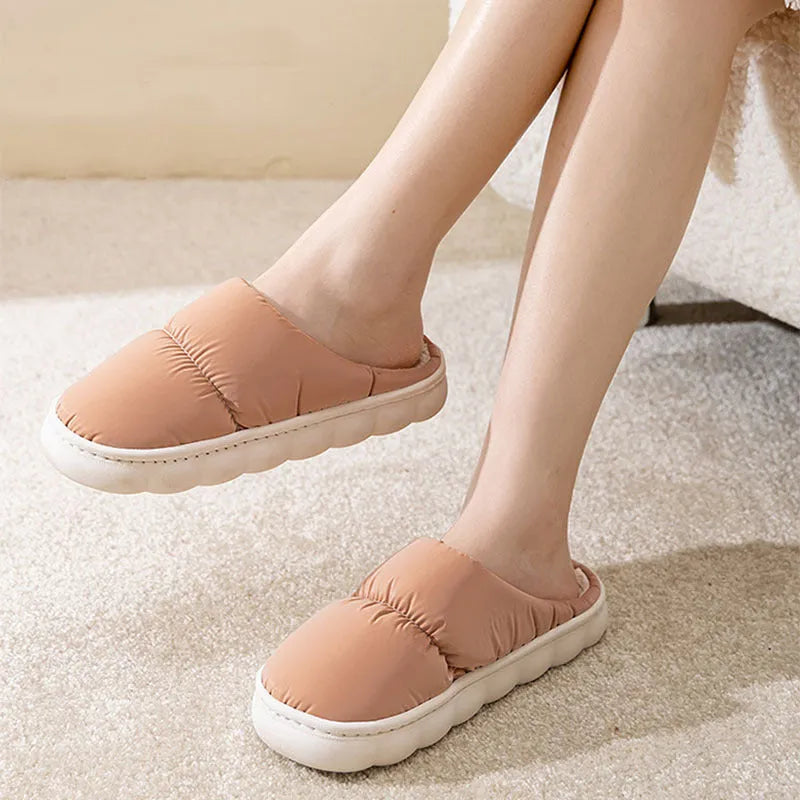 Down cotton winter slippers with artificial leather upper, thick rubber sole, and plush lining in blue colour