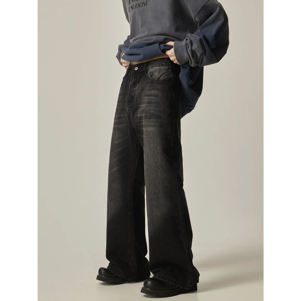 Black loose straight leg men's jeans with retro styling and zipper fly