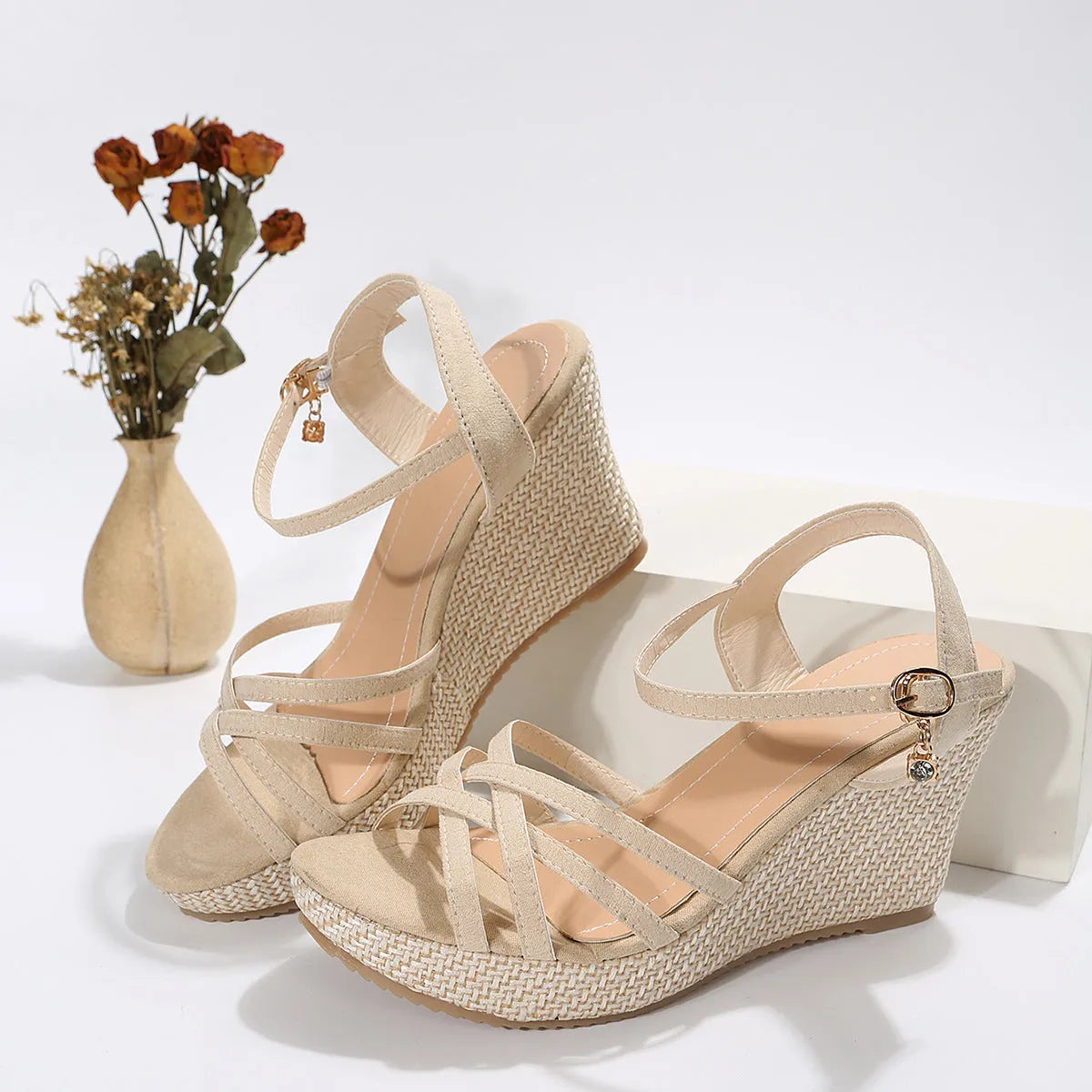Women's black wedge sandals with fabric uppers and fish mouth toe design