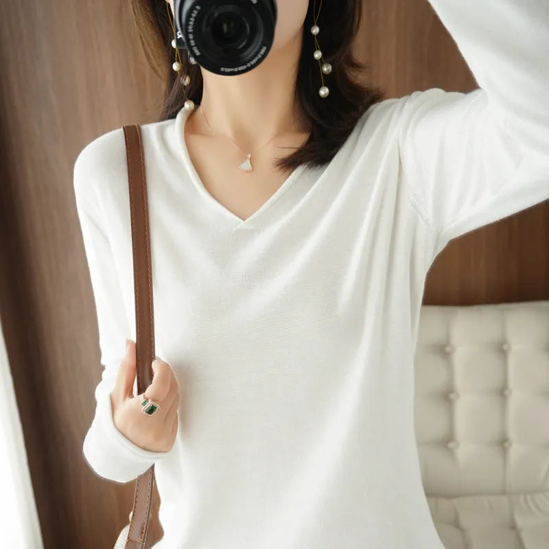 Women's V-neck long sleeve knitwear pullover top in turmeric colour with non-ironing process