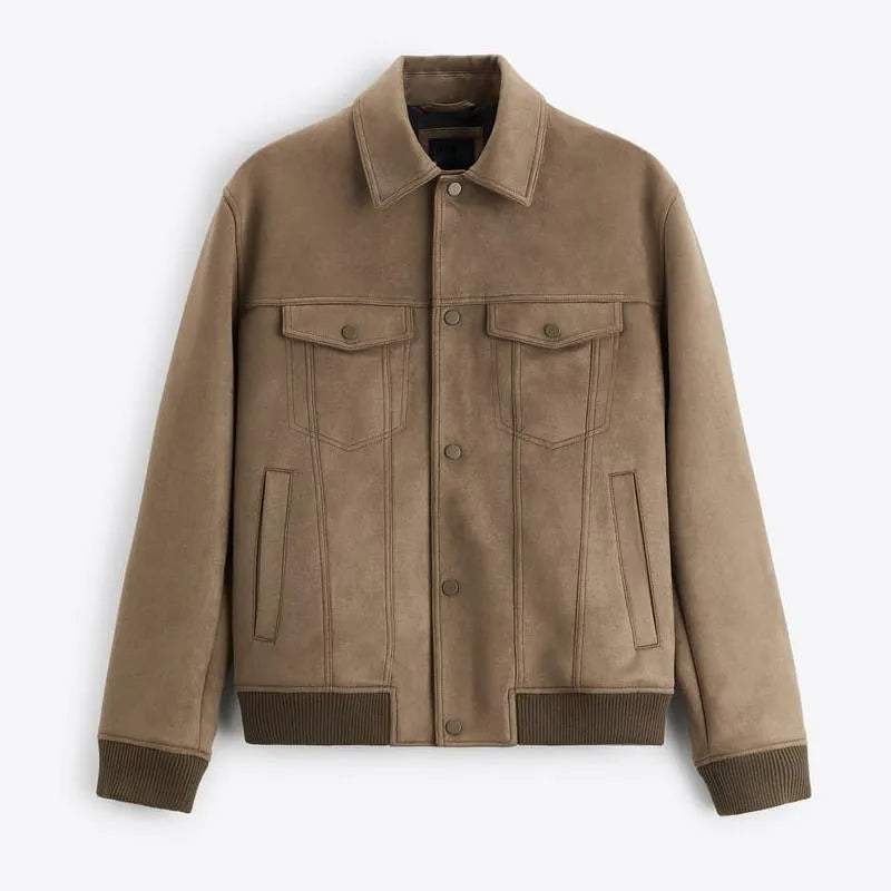 A Mink coloured velvet jacket with British style tailoring and long sleeves, laying flat.