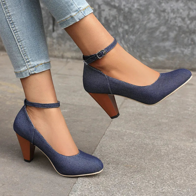 Women's blue denim platform high heels with an ankle buckle and waterproof sole.