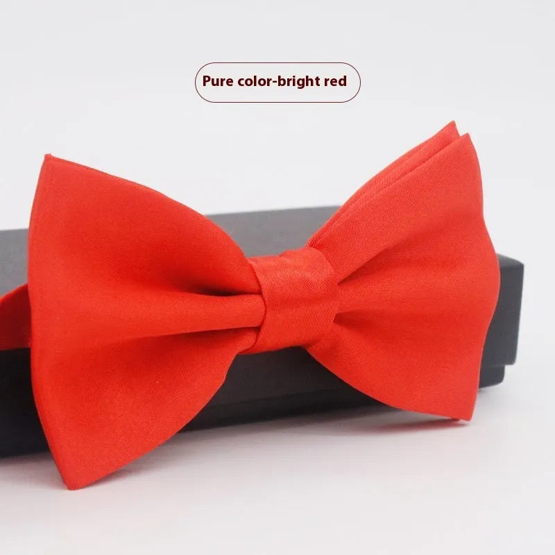 Solid colour polyester bow tie with flat head design measuring 12cm by 6cm