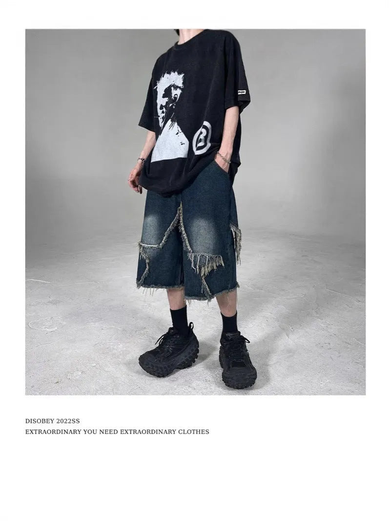 Blue denim shorts with frayed five-pointed star design and loose retro fit