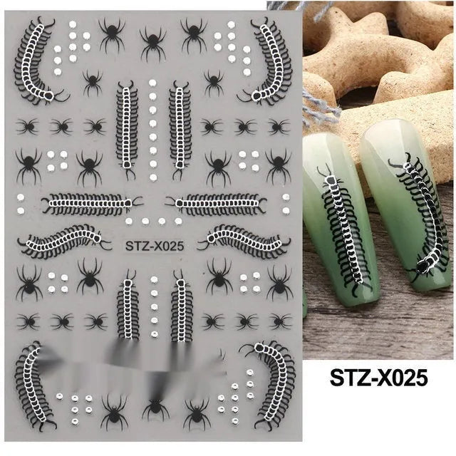 Sheet of black and silver strip nail art stickers with cartoon and love heart designs