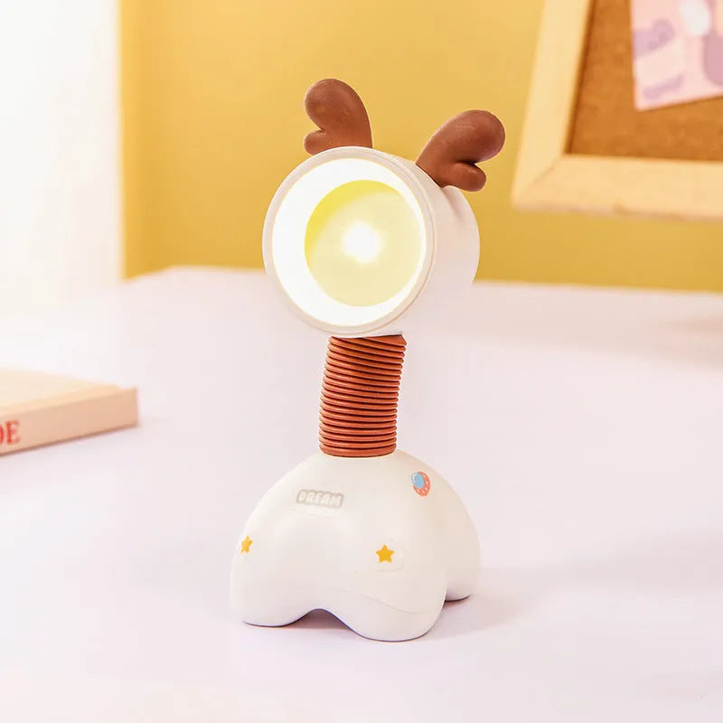 Cartoon animal magnetic night lamp with adjustable head on metallic surface