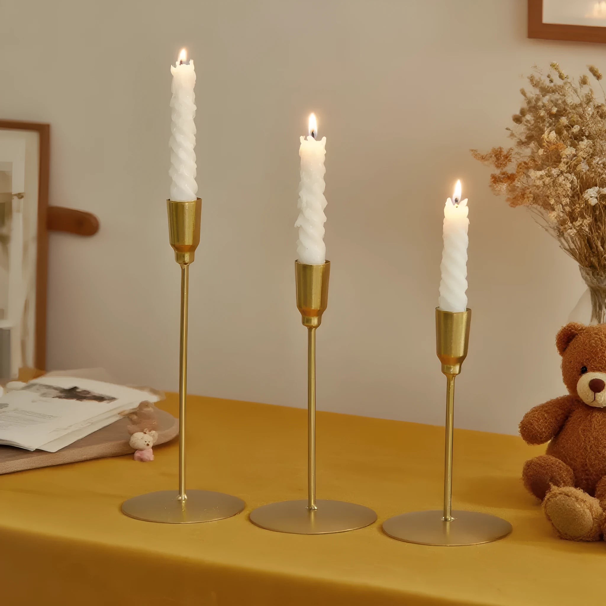 Handmade iron dining table candle ornament in gold colour available in multiple sizes