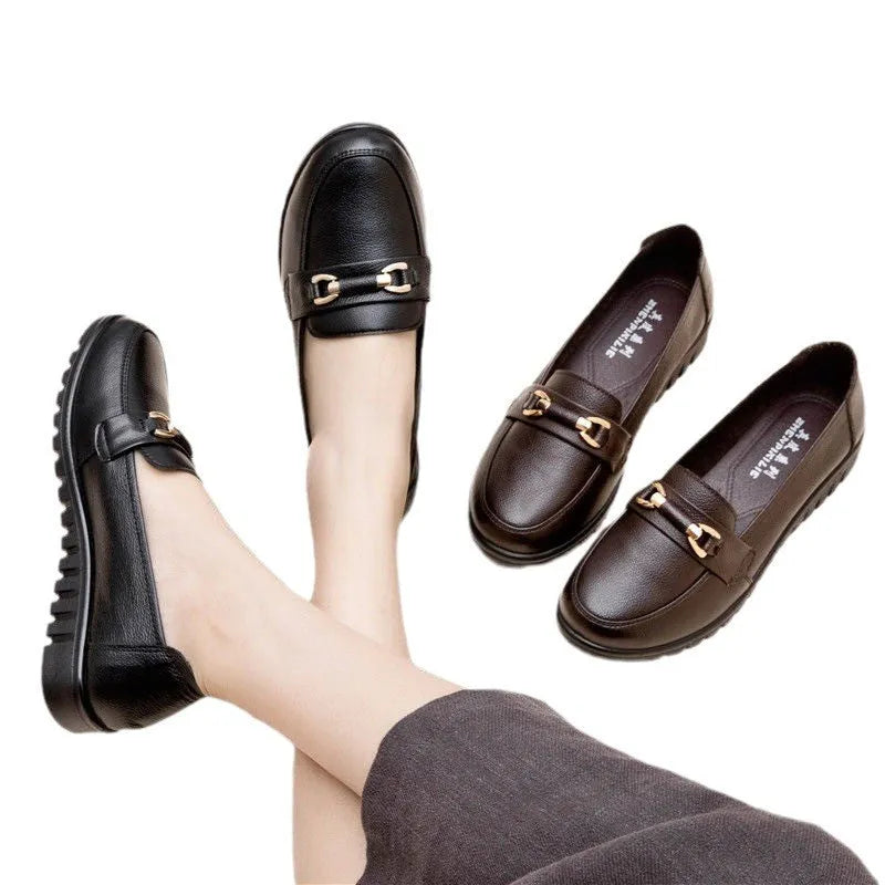 Black soft leather casual pumps with a round toe, flat rubber sole, and shallow slip-on design.