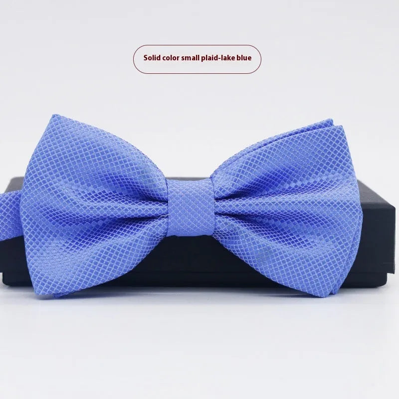 Solid colour polyester bow tie with flat head design measuring 12cm by 6cm