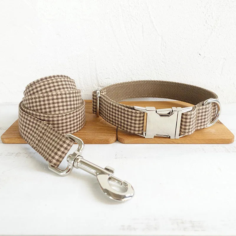 Pet leash and bow set in coffee grid polyester, available in sizes XS to XL