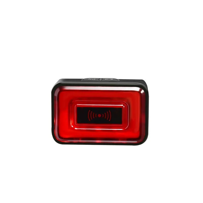 Black bicycle taillight with radar detection mounted on double bracket showing dimensions 59.0×39.5×28.5mm