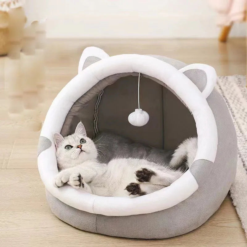 Enclosed cat litter kennel with plus velvet lining in camel colour, side view with mat included