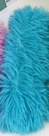 Green, white, blue, and pink plush cat toy pillow measuring 27 by 10 centimetres.