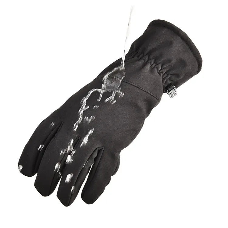 A pair of camouflage tactical ski gloves with touch screen fingertips on a winter background.
