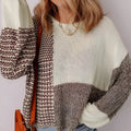 Dark khaki loose sweater with drop shoulders and a back tie fastening.