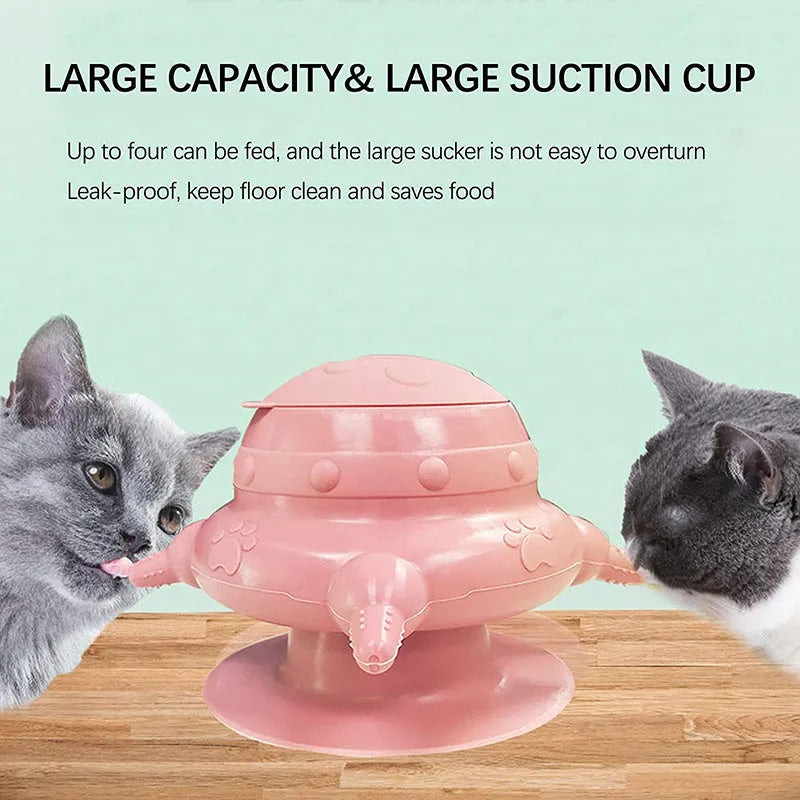 Pink silicone pet nursing feeder with bionic breast-shaped bowl and four pacifiers on a white background.