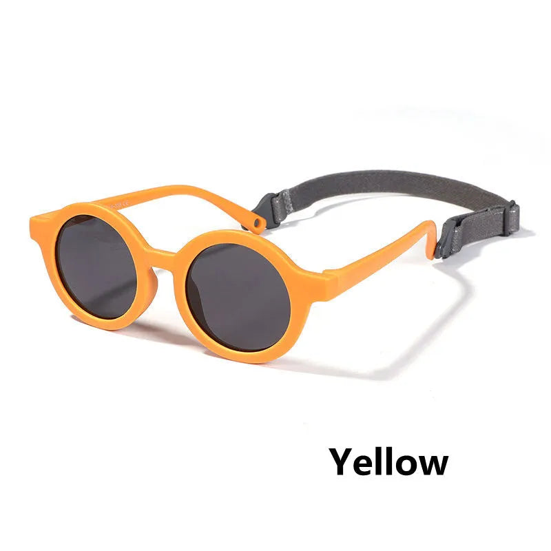 Children's round sunglasses for 0-3 year olds with UV400 protection, shown in a selection of colours.