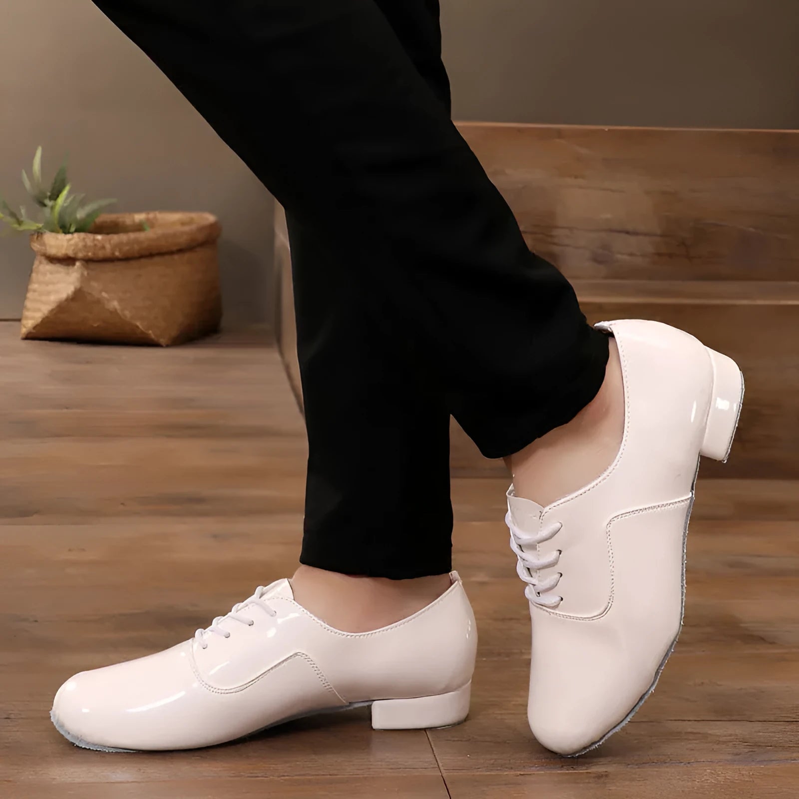 Men's black indoor dancing shoes with a synthetic leather upper and calf leather sole.