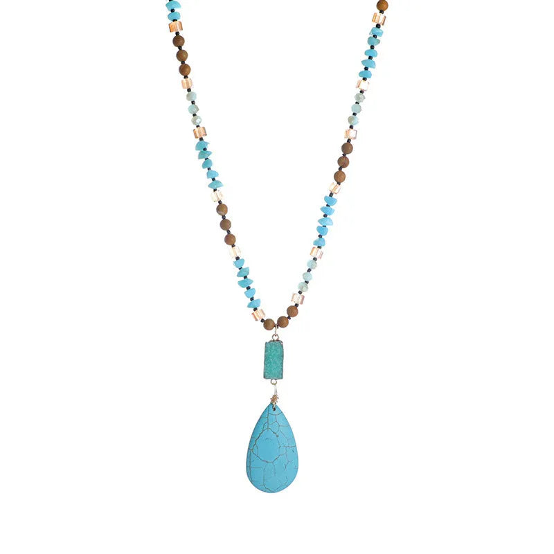 Turquoise water drop shaped pendant necklace with geometric design and ball bead chain