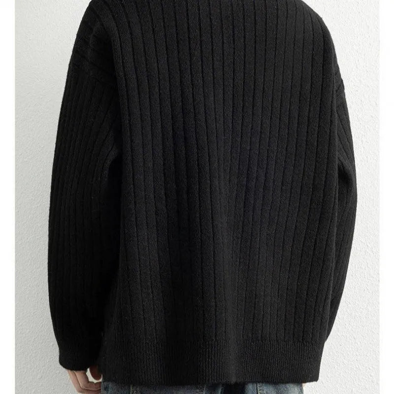 Men's grey loose-fit half zip textured knit sweater on a hanger