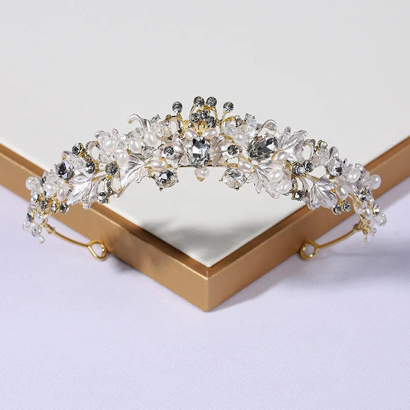 Pearl-decorated alloy crown headdress hair accessory in a gold electroplated finish.
