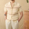 Camel coloured short sleeve knitted cardigan with lapel collar laid flat