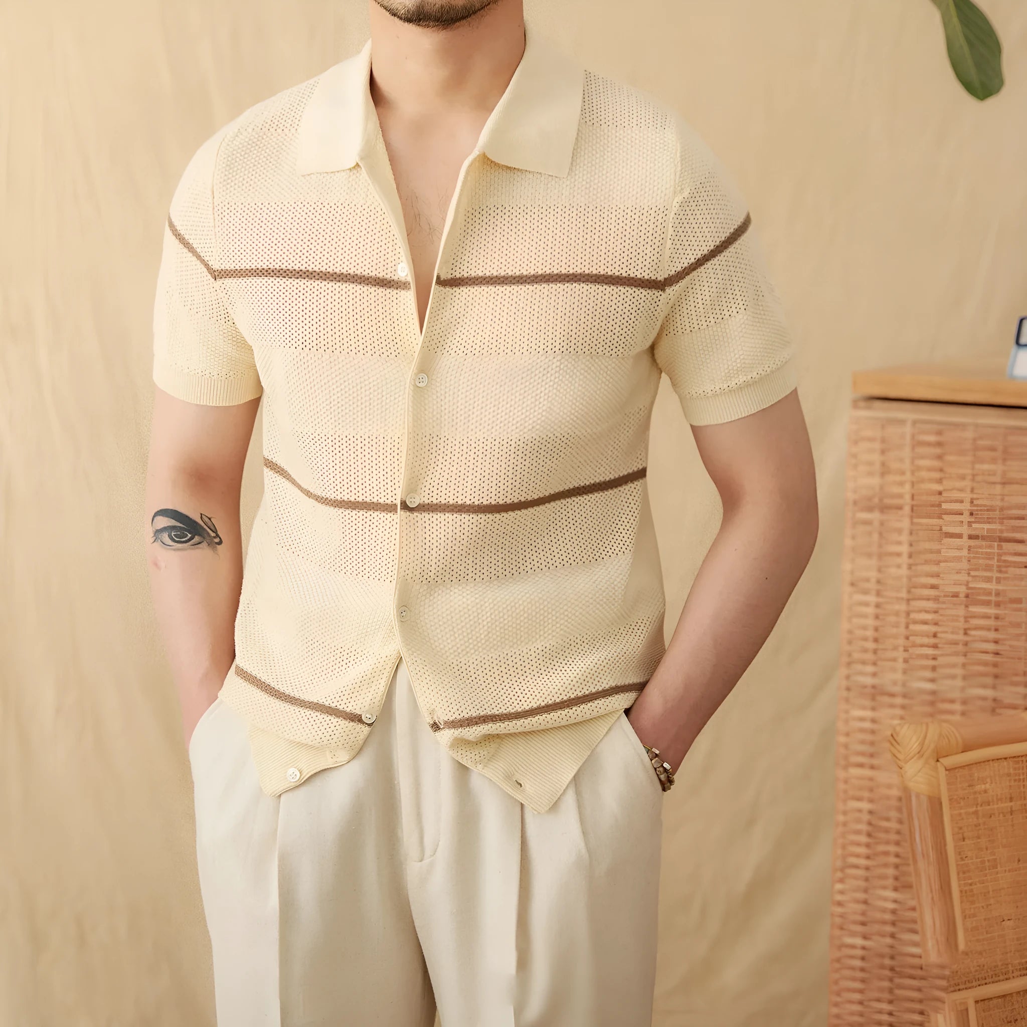 Camel coloured short sleeve knitted cardigan with lapel collar laid flat