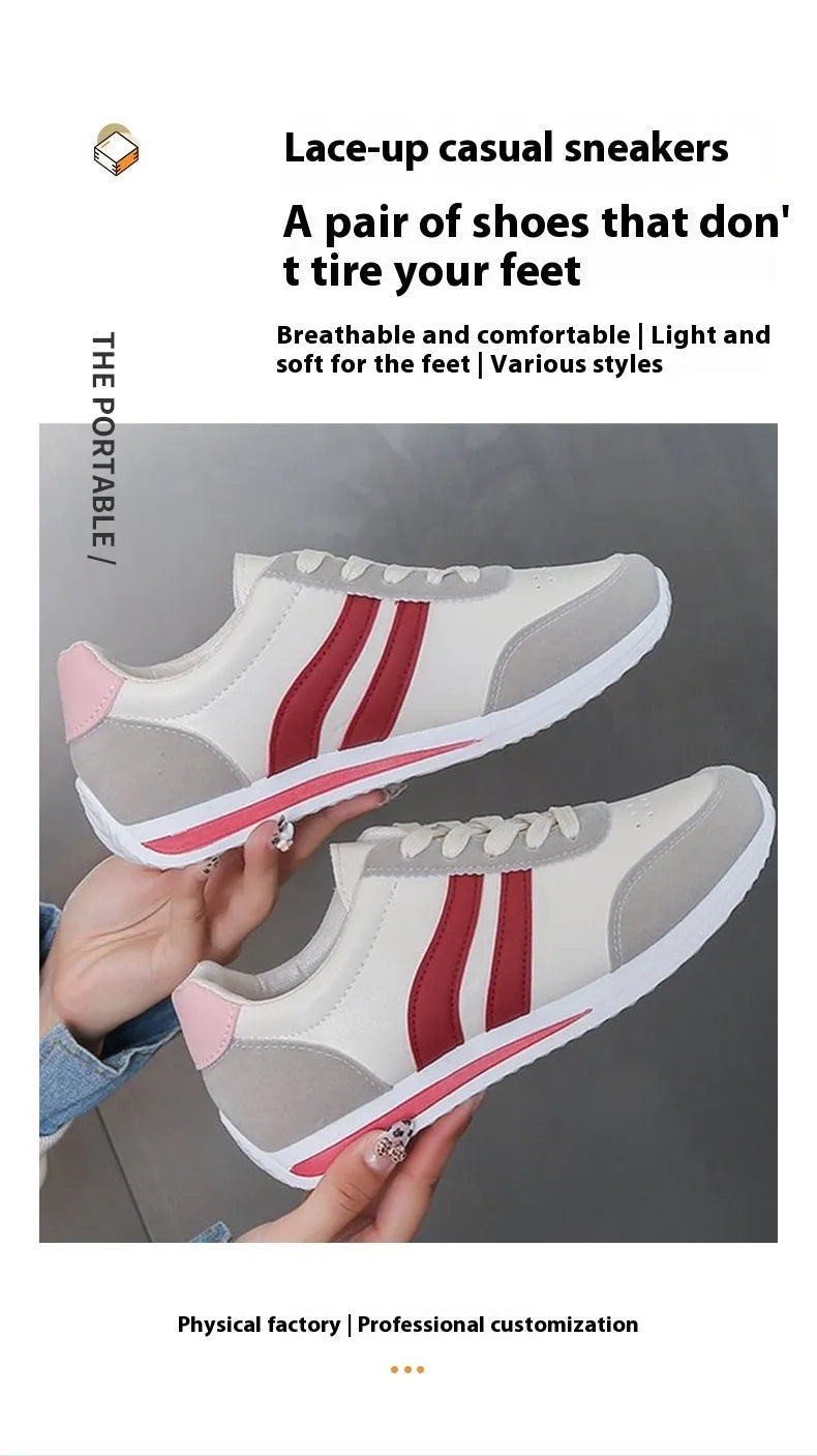 Low-top blue and red lace-up sneakers with mesh upper and rubber sole on a white background