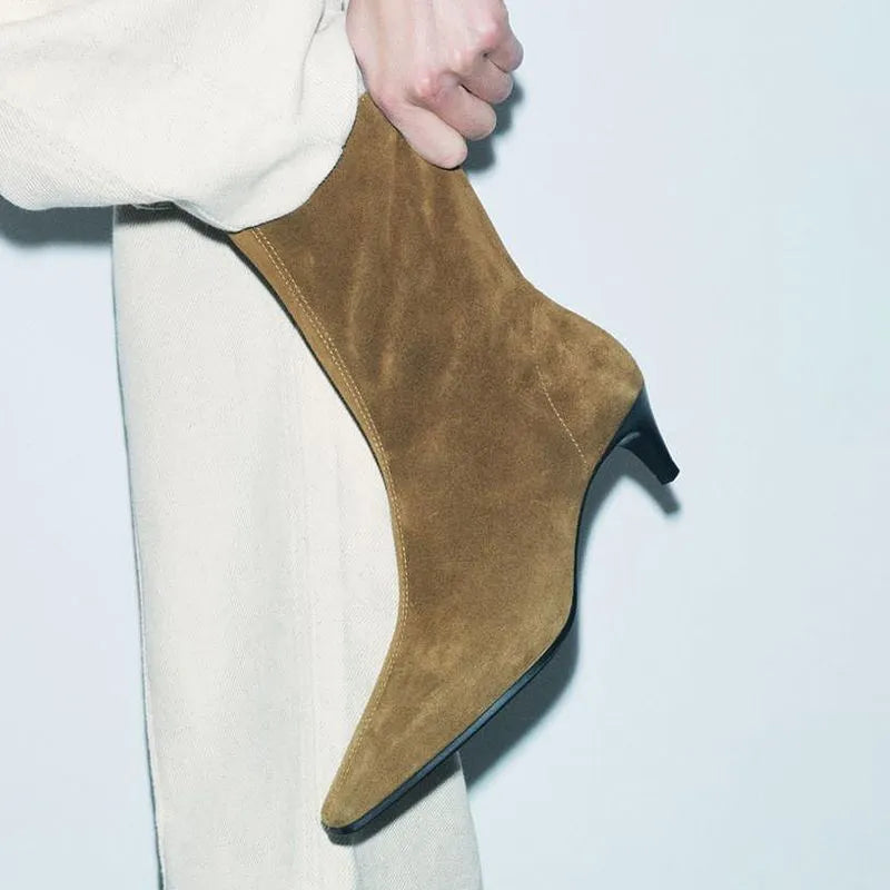 Brown square toe mid-calf boots with a side zipper and pointed stiletto kitten heel on a white background.