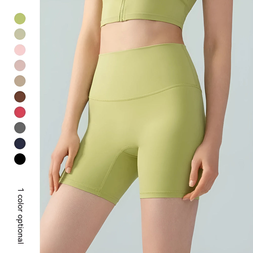 Women's lycra yoga tight shorts in leaf green colour showing high waist and short length design
