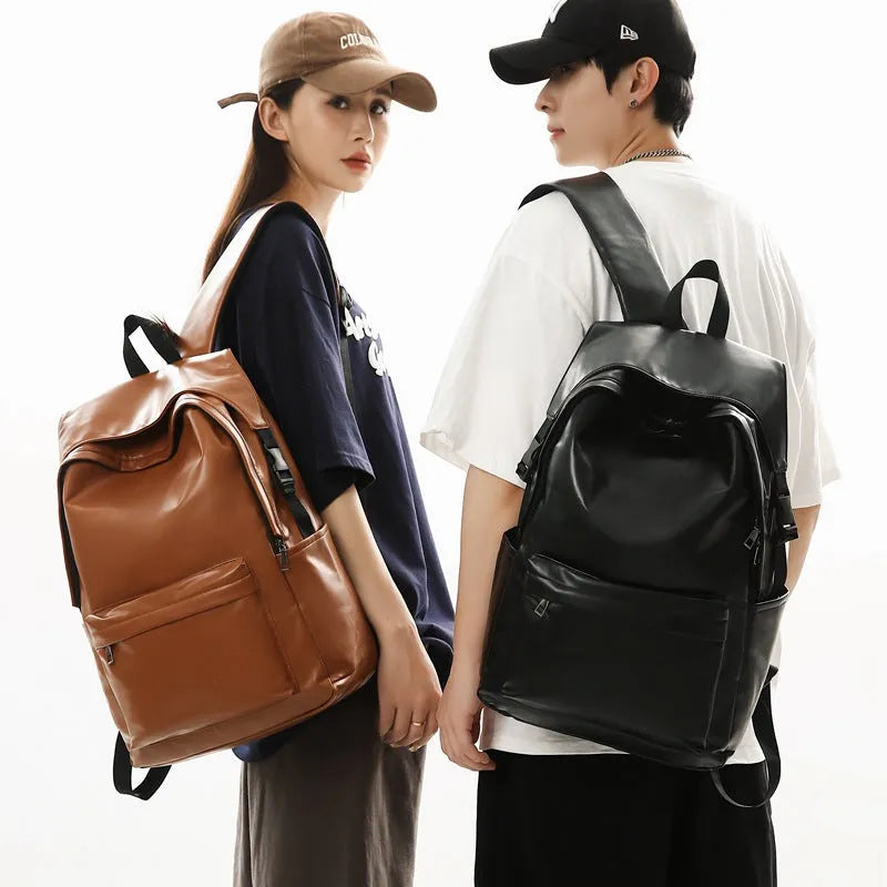 Travel Out large capacity PU leather backpack in black with air pillow belt and sewing thread design, 33x16x46cm