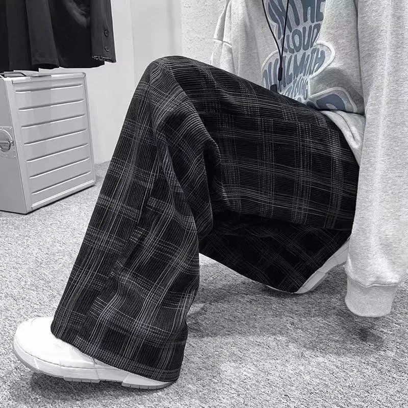 Men's black plaid loose fit straight leg casual trousers with Japanese-inspired design